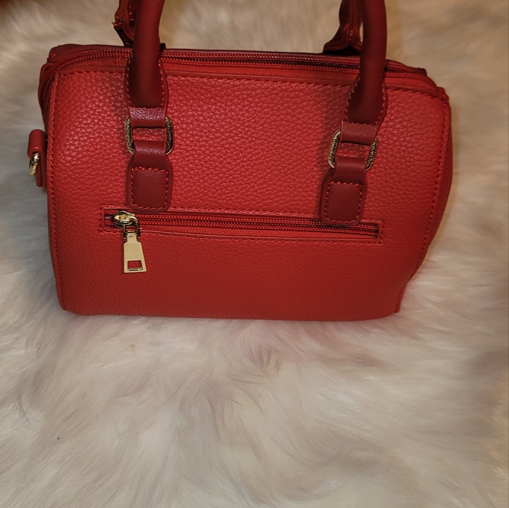 New Red medium size cute purse but no Tags